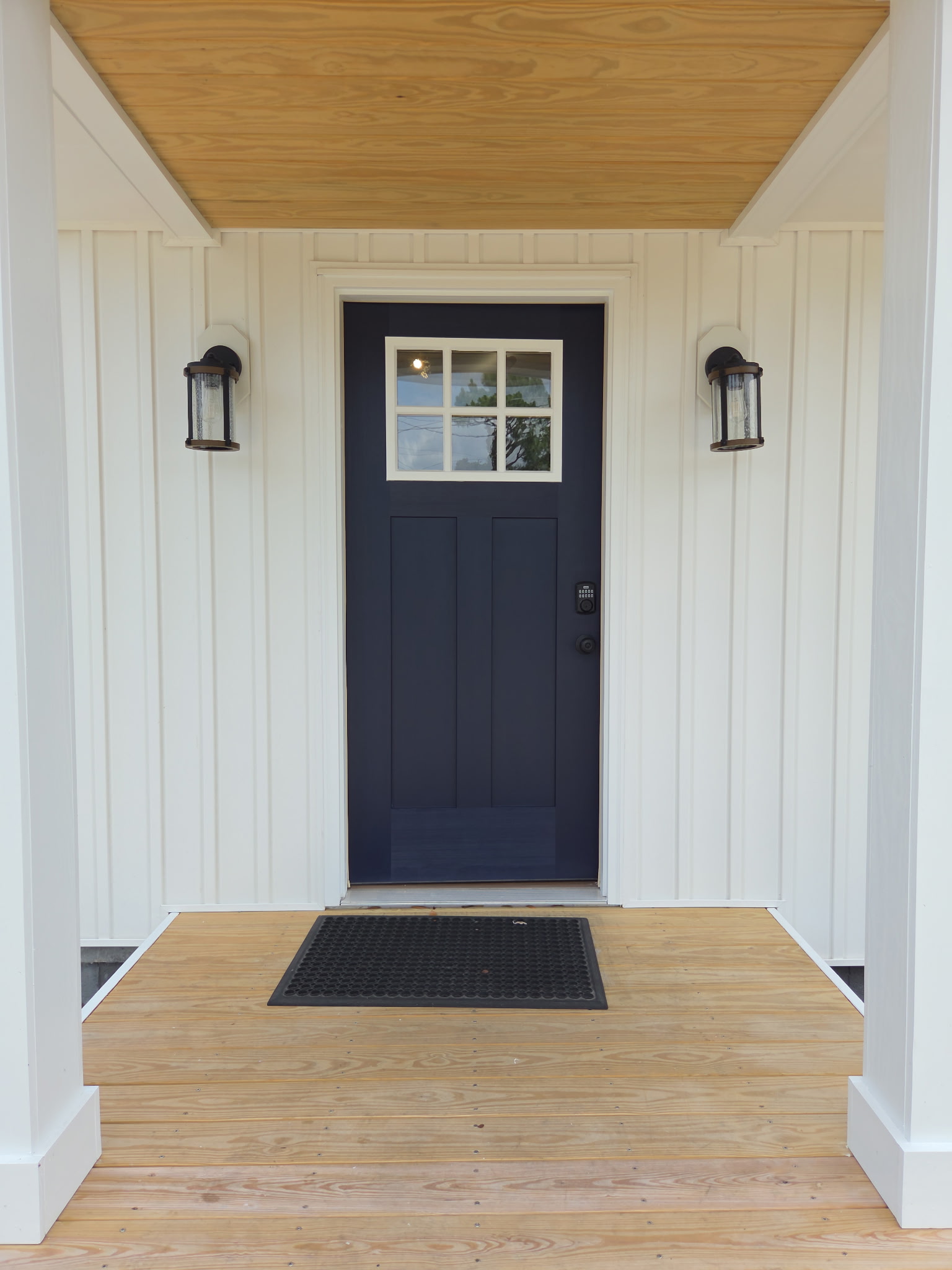 Professionally painted black front foor and white porch
